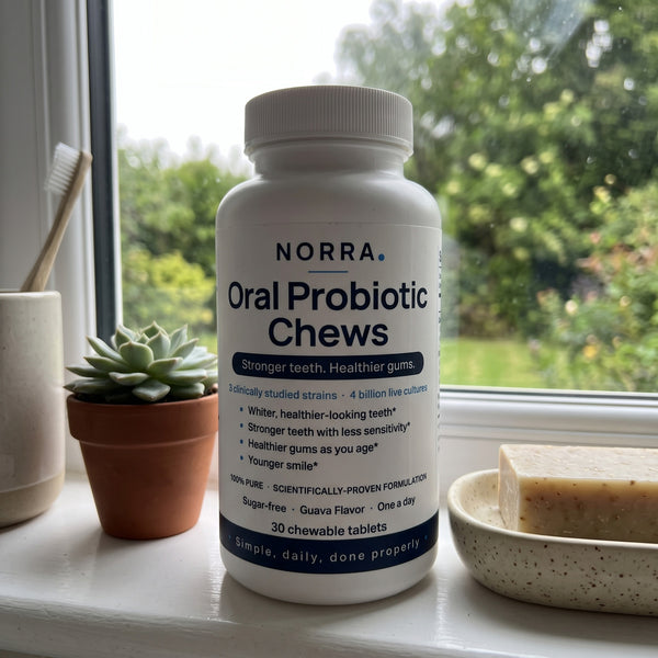 A bottle of Norra on a bathroom windowsill in daylight